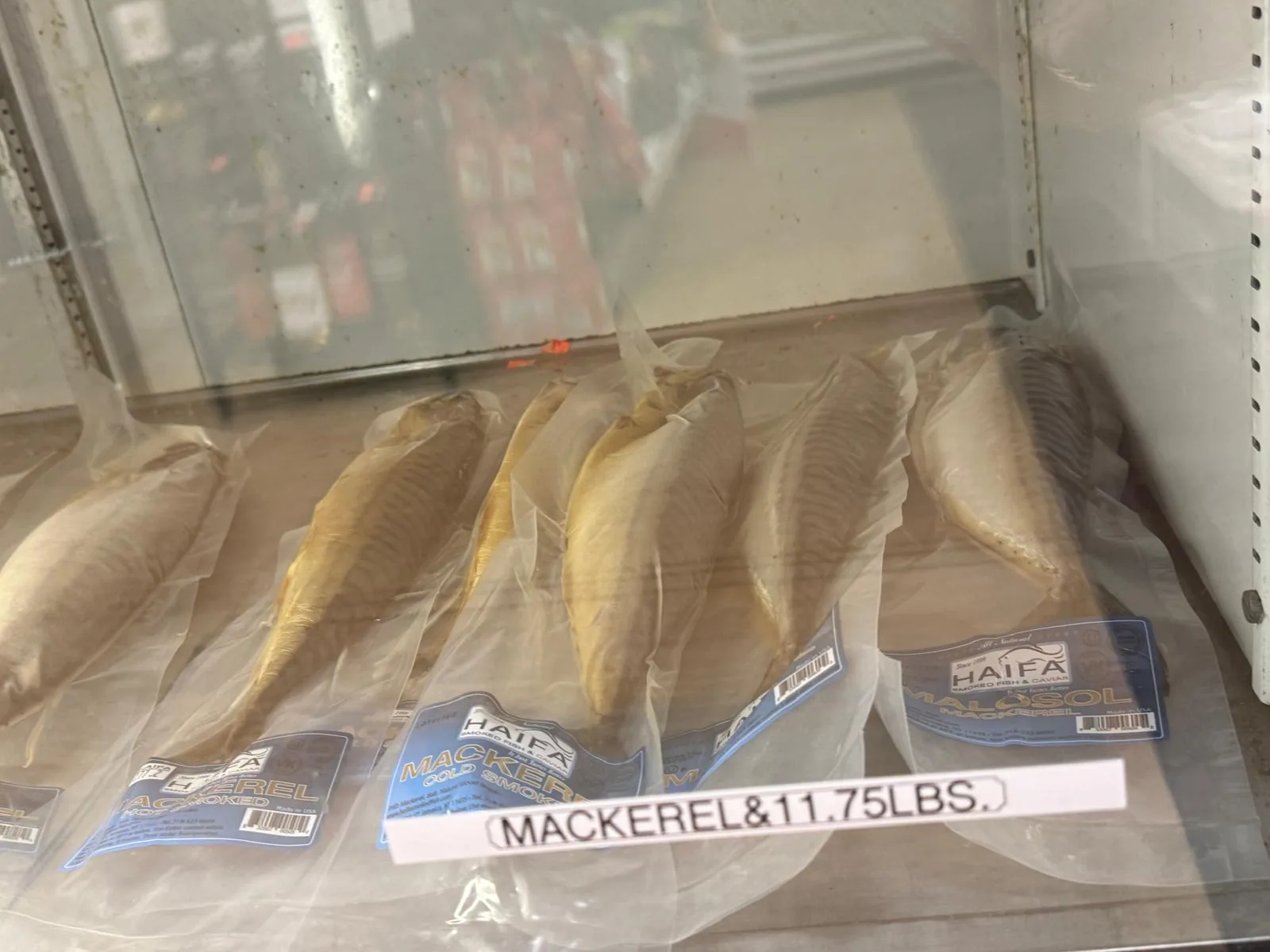 Whole frozen mackerel in the fish freezer