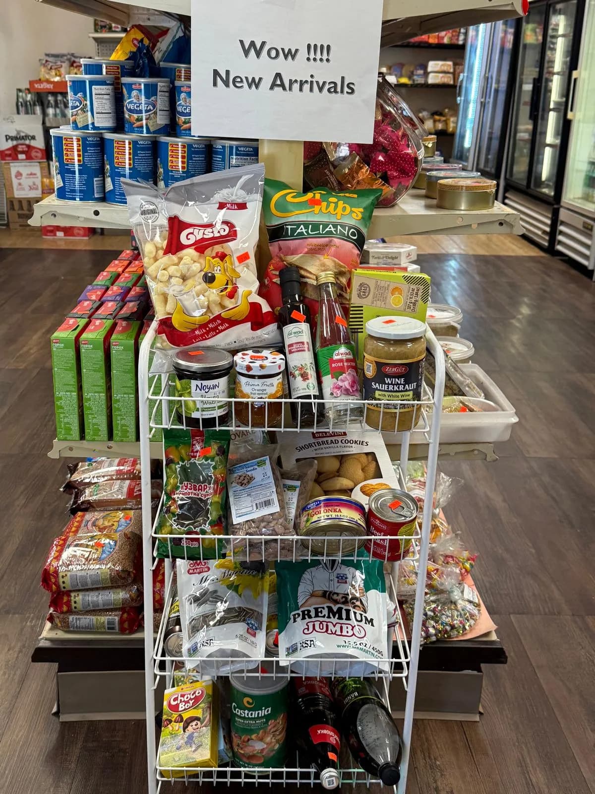 A 'new arrivals' rack of just-delivered imports in the market aisle