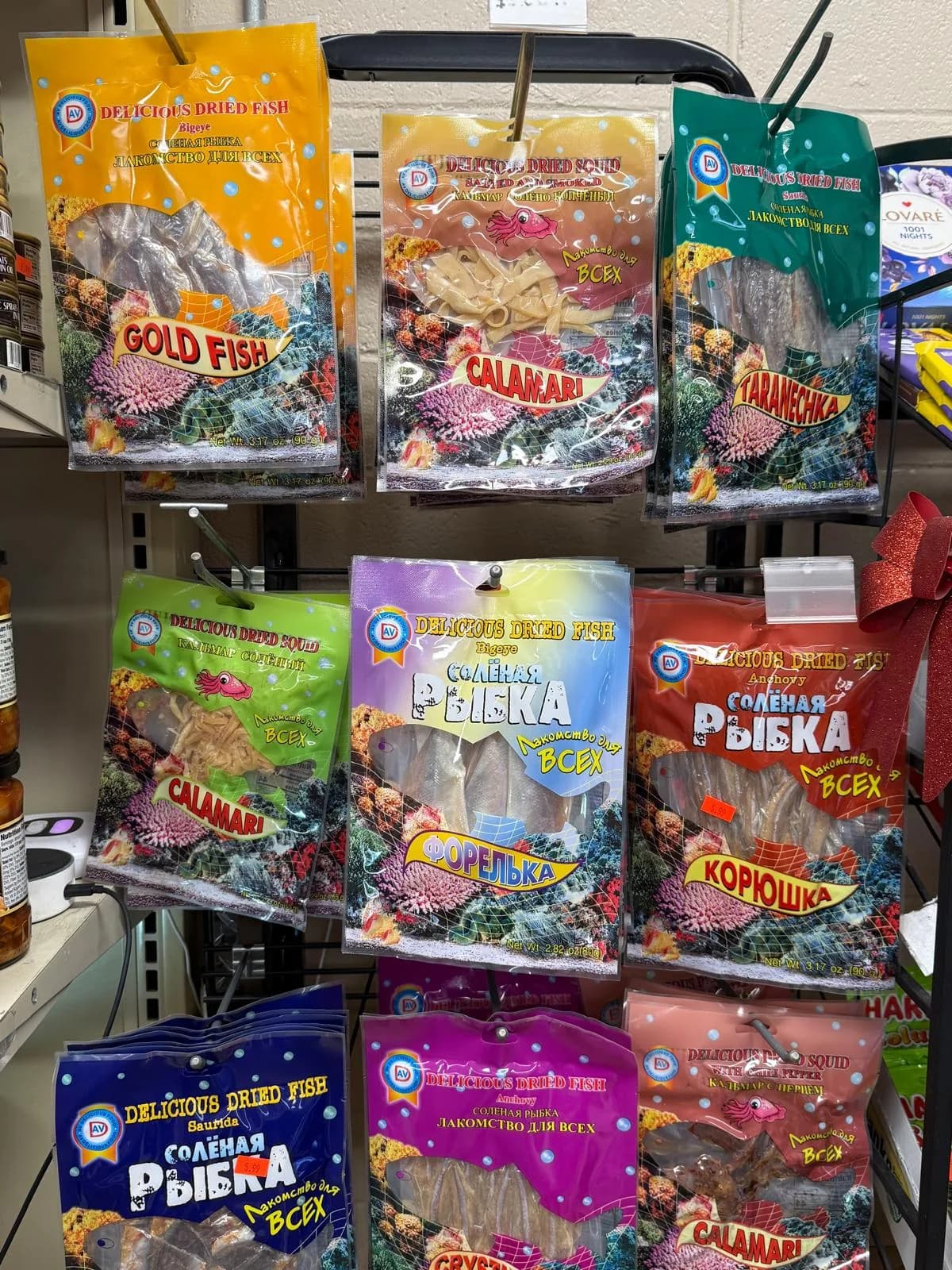 Packages of dried and smoked fish snacks