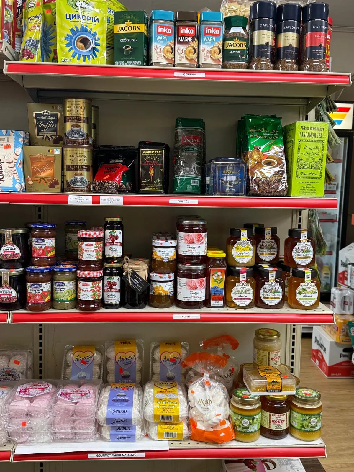 Shelves of imported sauces, mustards, and condiments