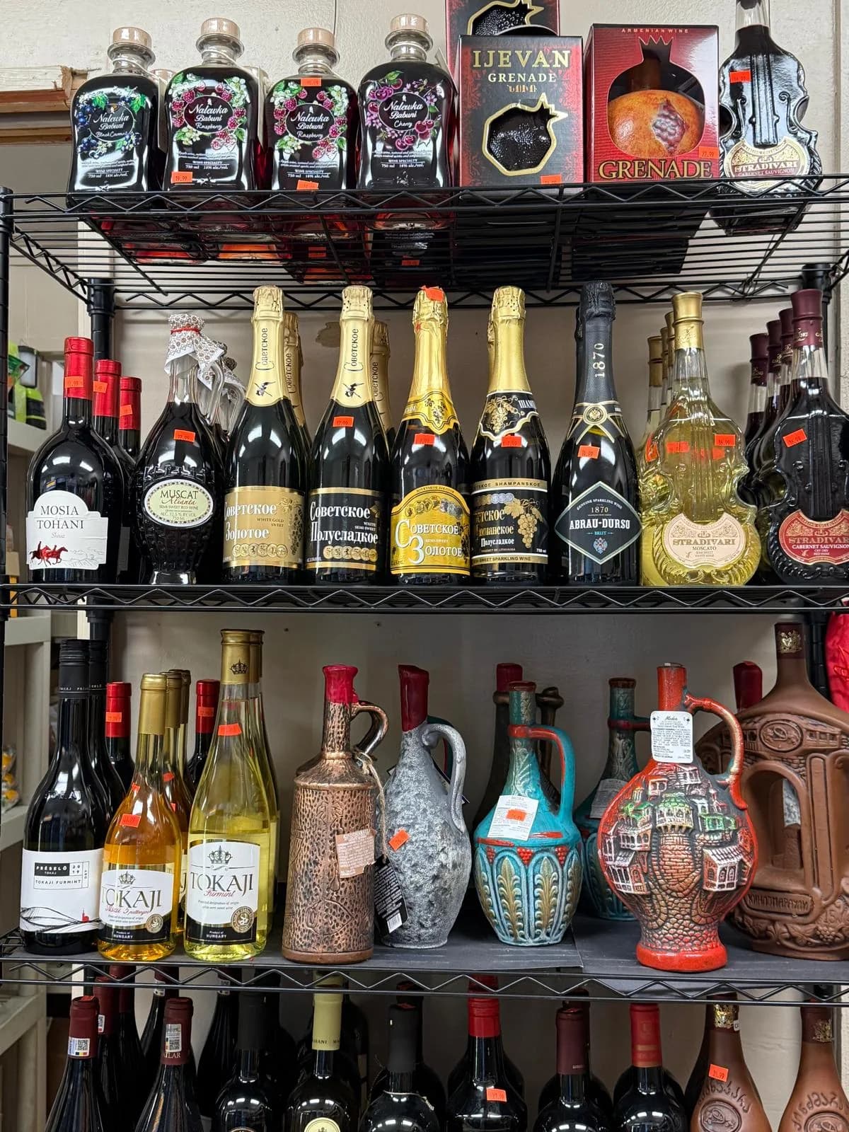 A display of European bottles on the market shelf
